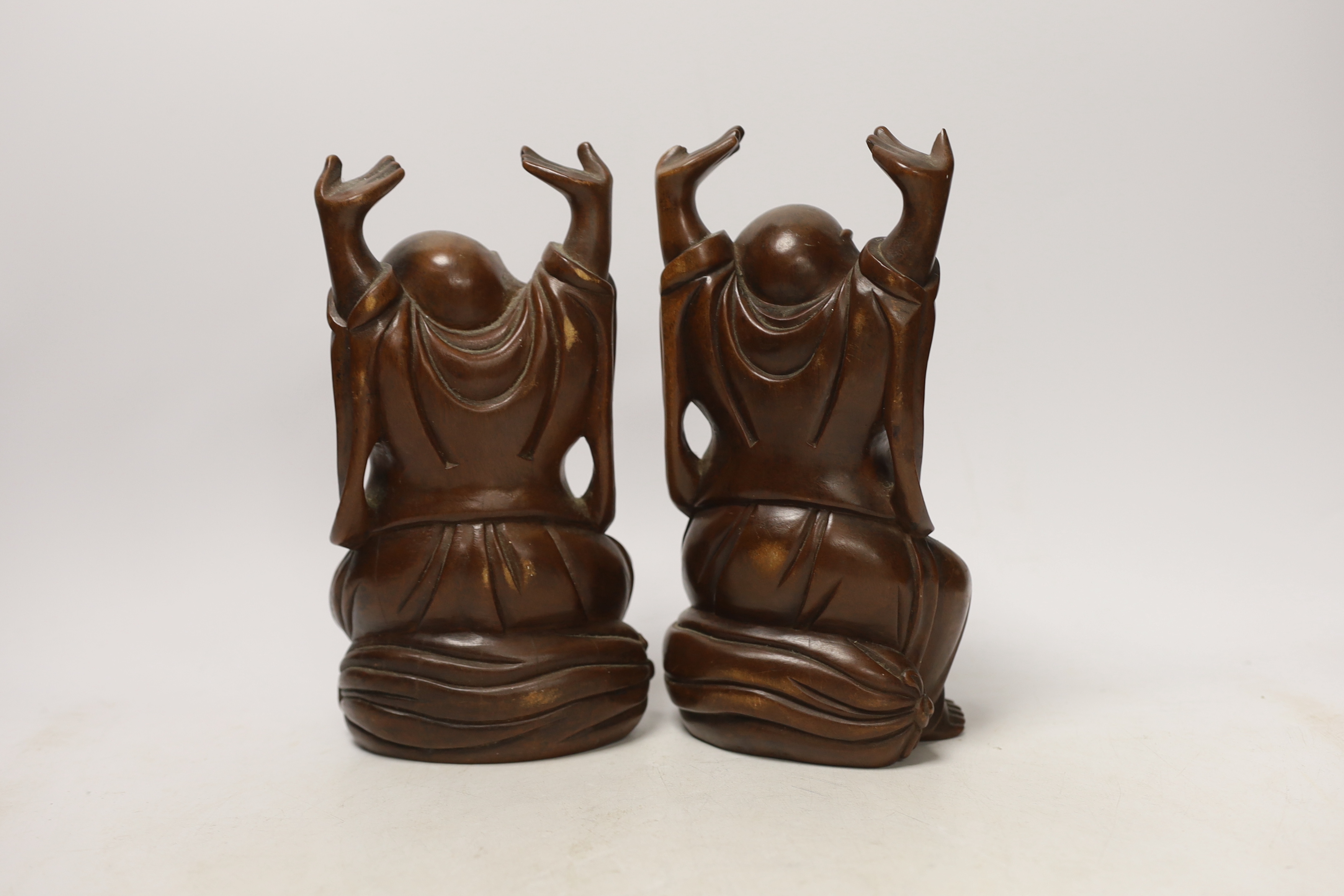 Two Chinese carved wood figures of Budai, 22cm high